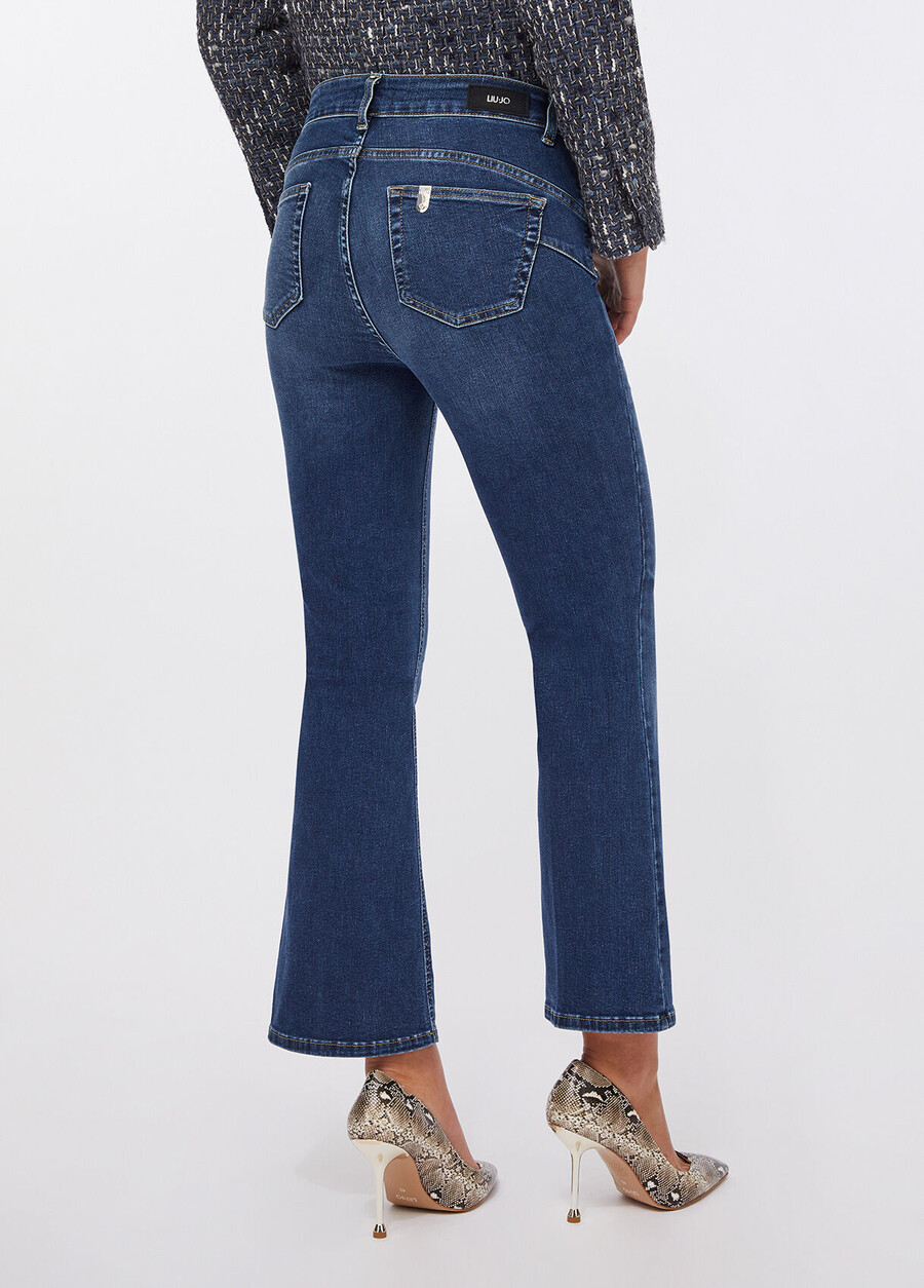 jeans a zampa con bottoni gioiello