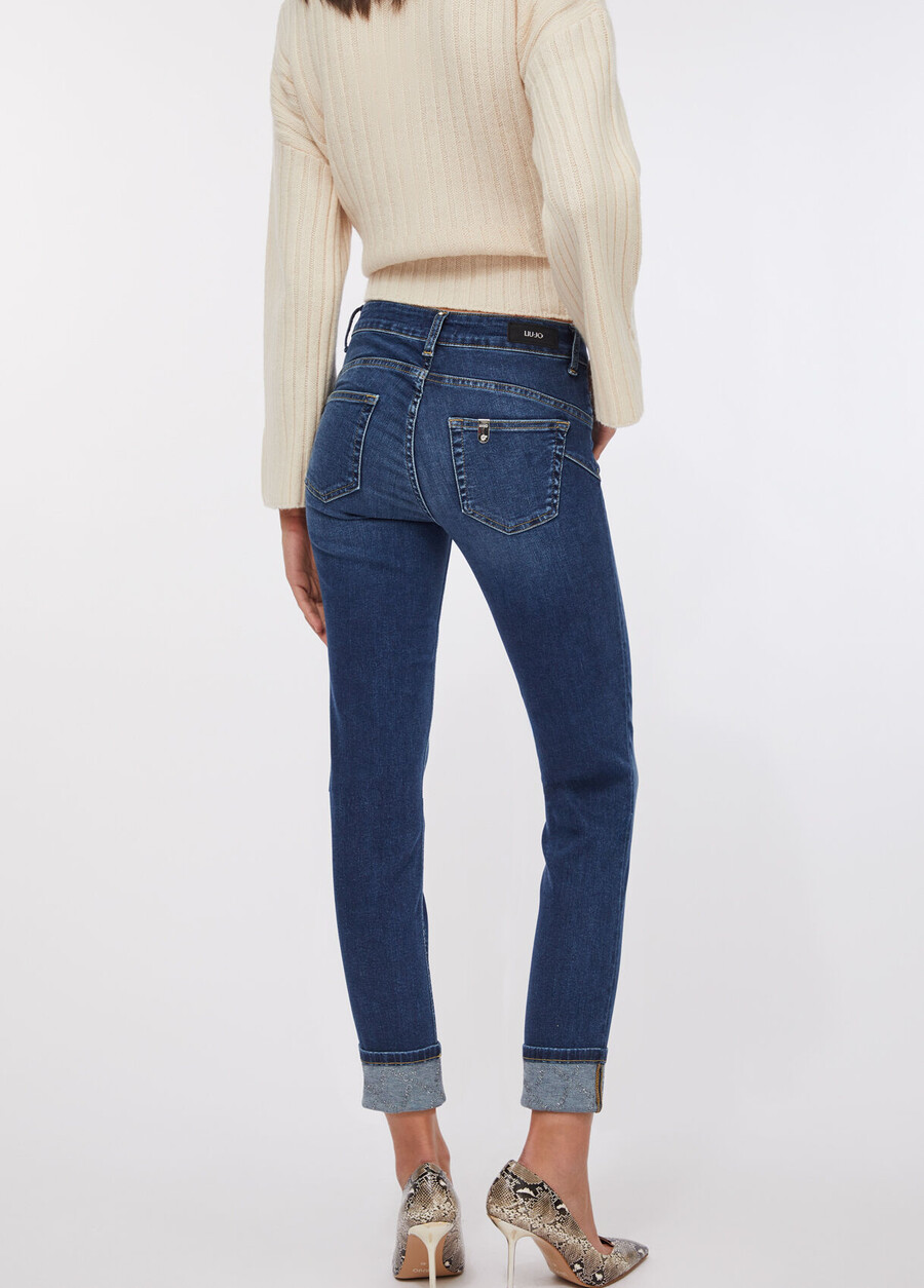 jeans skinny con risvolti