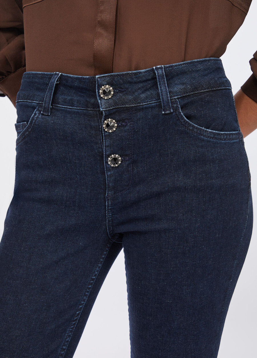 jeans skinny con risvolti