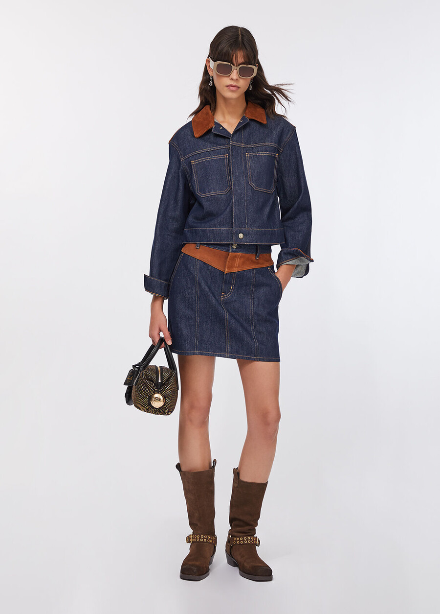 minigonna in denim con inserto in pelle scamosciata
