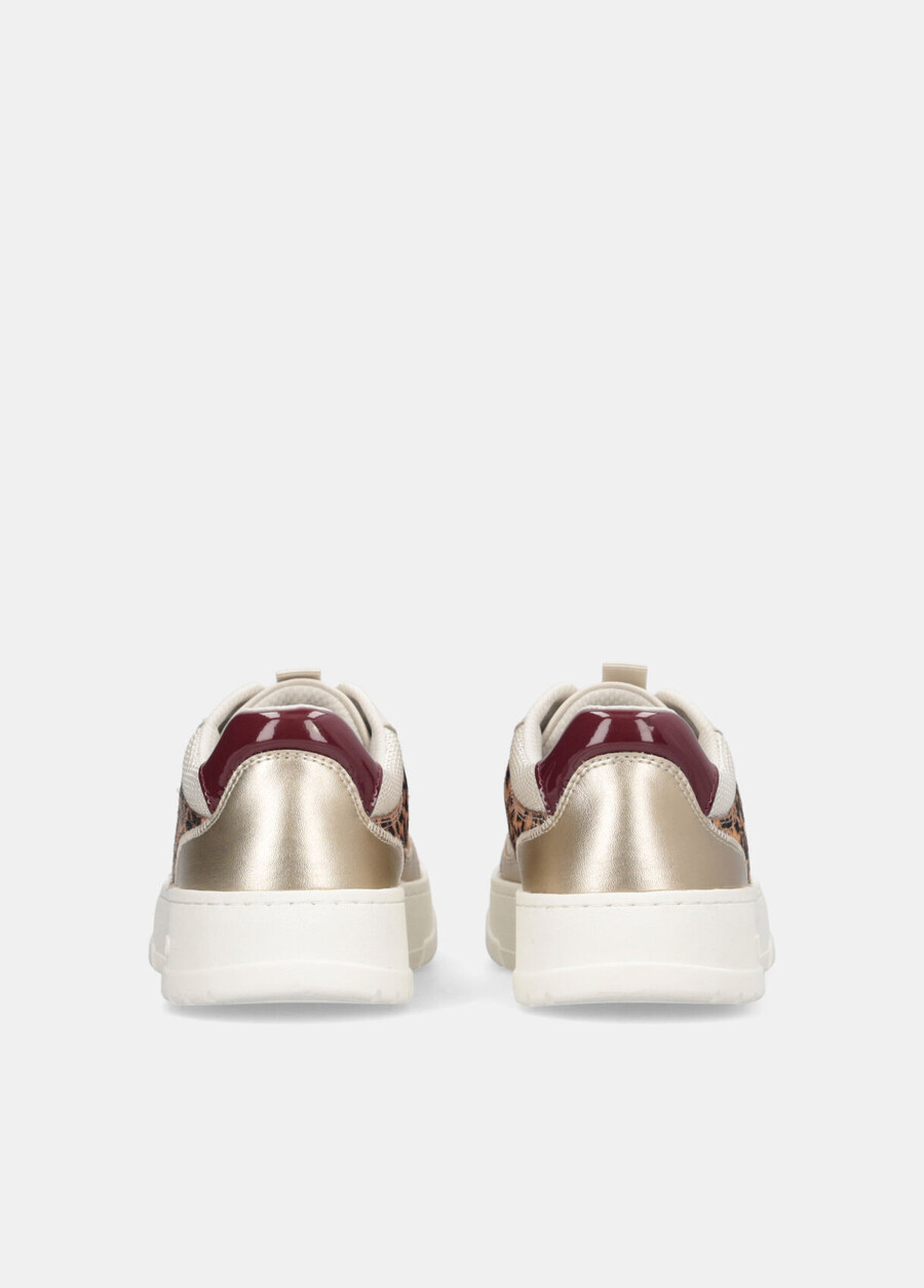 slip-on con dettagli animalier